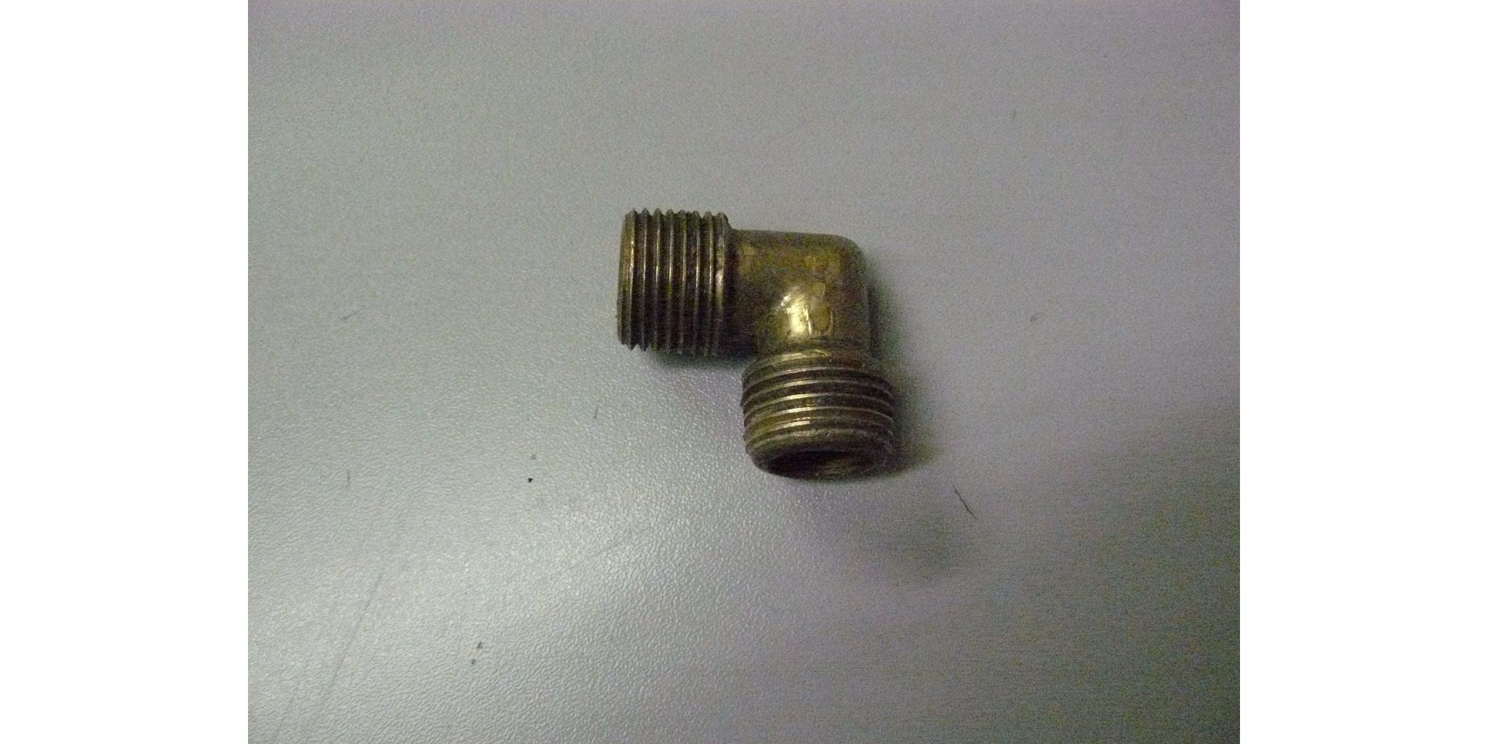 Патрубок угловой для Зубр ЗКЭМ-2000-50 <br>(Артикул: U571-200-042)